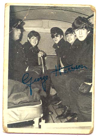 beatles with uncomfortable cop