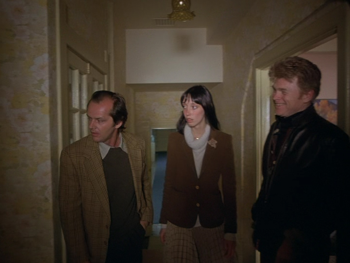 The Shining - Wendy unbolts the door to let Jack in