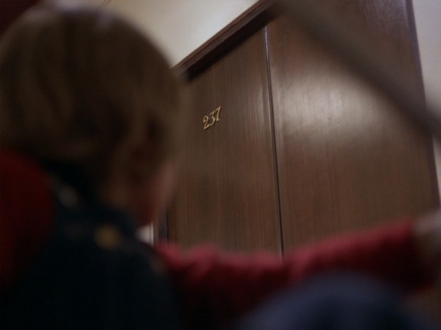 The Shining - Another shot of Danny looking up at the doors of Room 237